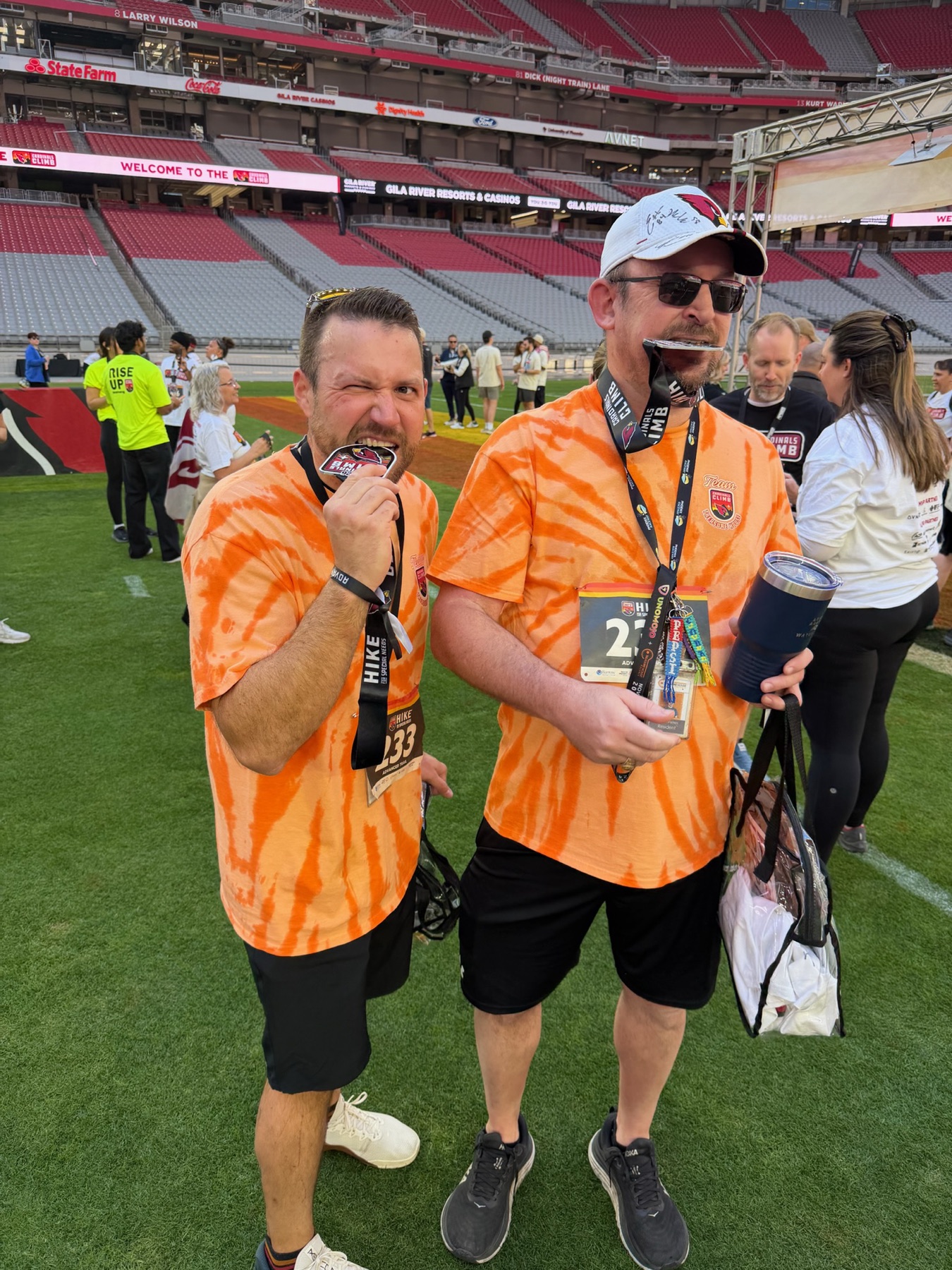 Two residents on the field at a community event